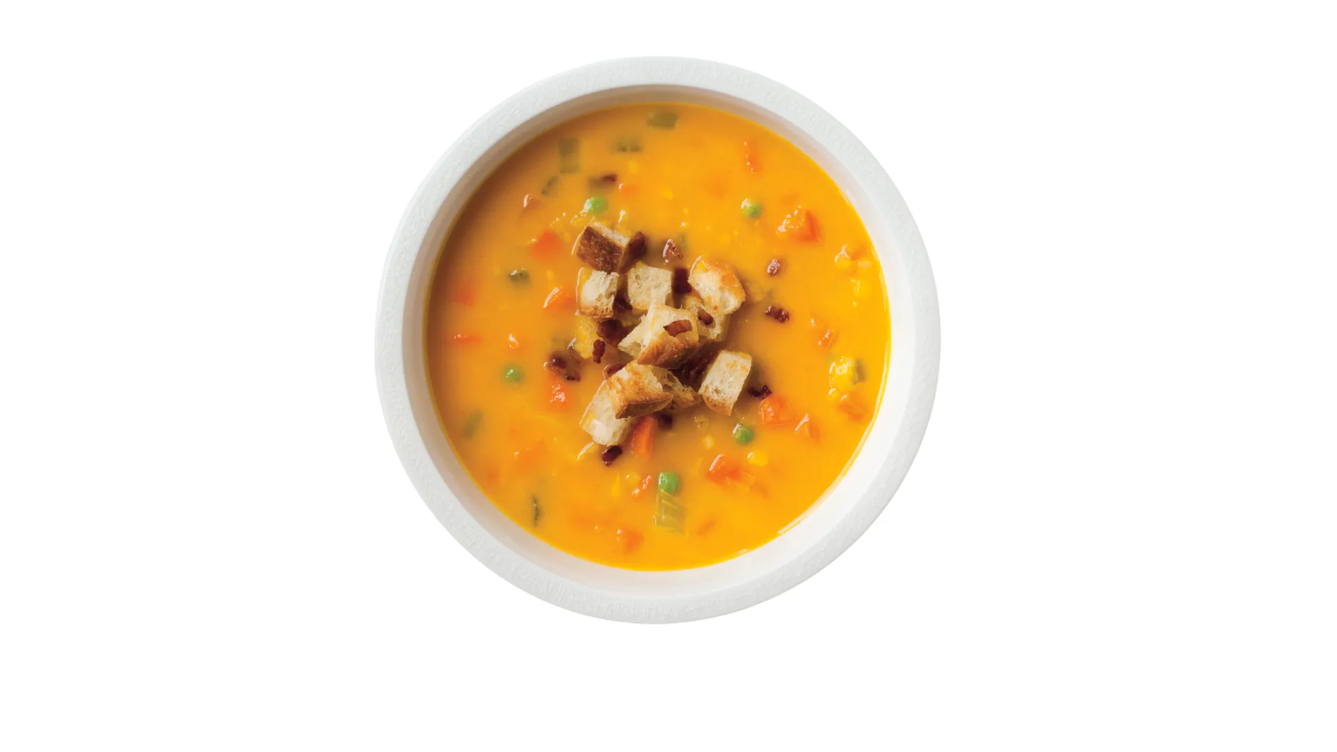 Sopa de verduras servida con picatostes sazonados